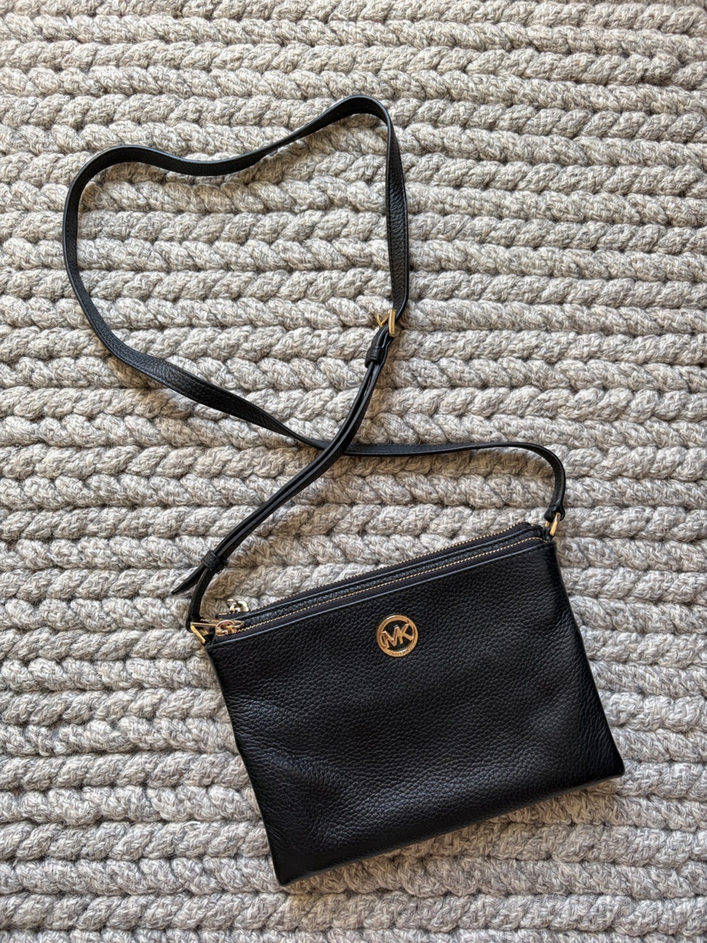 Black Michael Kors crossbody with interior wallet